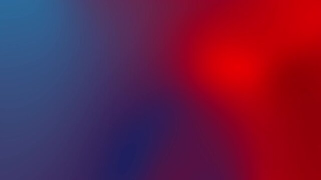 Abstract blurred background with a gradient of blue and red colors.