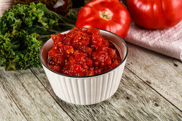 Diced ripe tomato with sauce