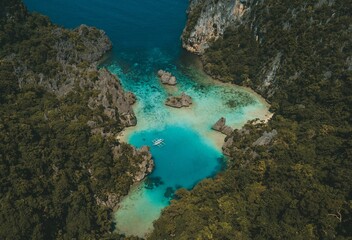 Aerial view of a turquoise lagoon in El Nido, Palawan.
