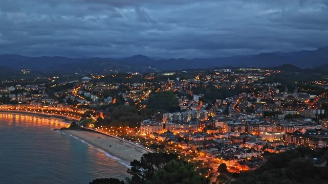 Panoramic view of San Sebastian city from Monte Igueldo after sunset. San Sebastian, Spain.