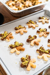 Making Holiday Star Cookies, Chocolate-Dipped with Pistachio Topping