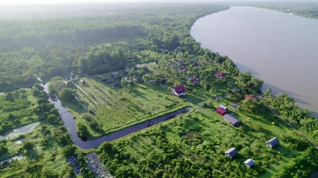 Drone view of Frederiksdorp village and commewijne river, Suriname, drone descending