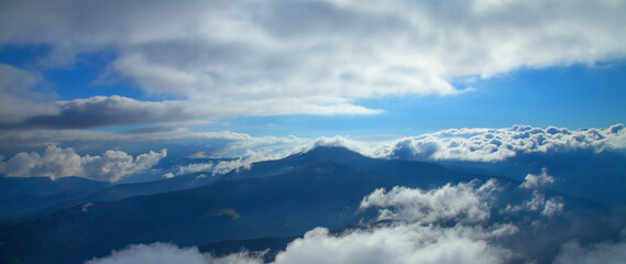Between heaven and earth. Fog, clouds, nebula and clouds in the mountains. Beautiful landscape....