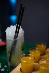 Vibrant and Colorful Shot Glasses Arranged on a Tray for a Fun and Lively Party Event