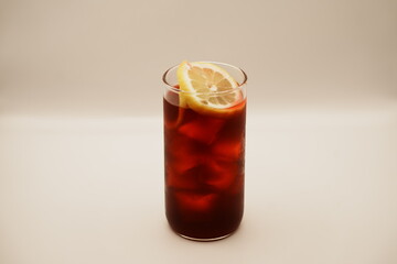 glass of orange juice with ice