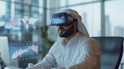 A man with a beard is wearing a virtual reality headset, sitting in an office chair