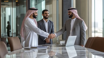 Three business professionals are interacting in a sleek office with large windows