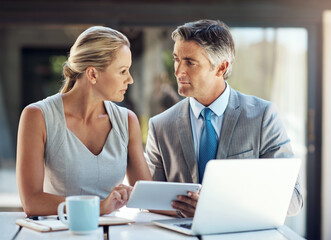 Fototapeta premium Business people, thinking and laptop with tablet in meeting for corporate, investment and brainstorming. Finance, employee and collaboration with tech at work for audit report, review and teamwork