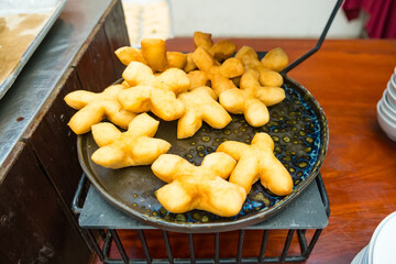 Golden Patongo on a Black Tray.