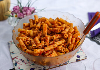 baked pasta with ham in tomato sauce