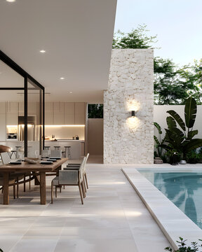 A luxurious outdoor dining area with an elegant table set for four, surrounded by a pool and covered kitchen in the background. The space is adorned with modern lighting. 3f render.