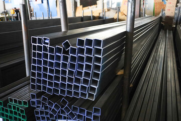 Obraz premium steel pipe product group square pipe Construction steel products such as black steel pipes, image ideas, examples of steel products.metal warehouse industry, delivery to customers.