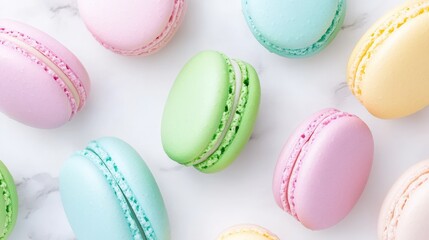 Obraz premium Pastel macarons arranged on a marble surface: sweet delight and colorful elegance