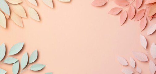 Fototapeta premium Pastel paper leaves arranged in a frame on a peach background.