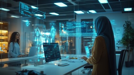 Two women engage in a collaborative project in a contemporary office, utilizing advanced digital interfaces. The environment is illuminated by glowing screens displaying various data and graphics.