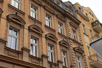 A significantly large and impressive building featuring numerous windows and balconies that enhance its architectural beauty and functionality