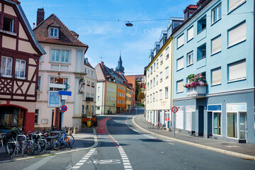Quiet street in a charming European town with colorful buildings