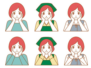 頬に手を当て悩み顔のショートカットの女性