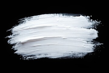 White paint brush strokes and splashes on black background