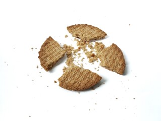 Cracked biscuit isolated on white background 
