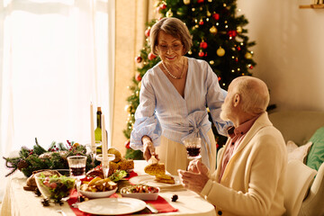 A joyful senior couple shares a delightful Christmas dinner in a cozy home filled with decorations.