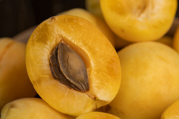 ripe soft apricot fruits on the cutting board