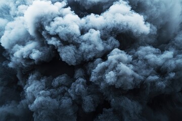 Dark Smoke Clouds Rising from Ground
