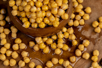 chickpeas porridge with honey during cooking