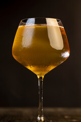 cold apple juice drink in a clear glass