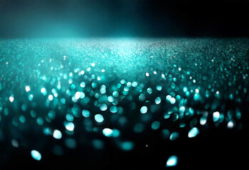 Abstract blue bokeh on a dark background.