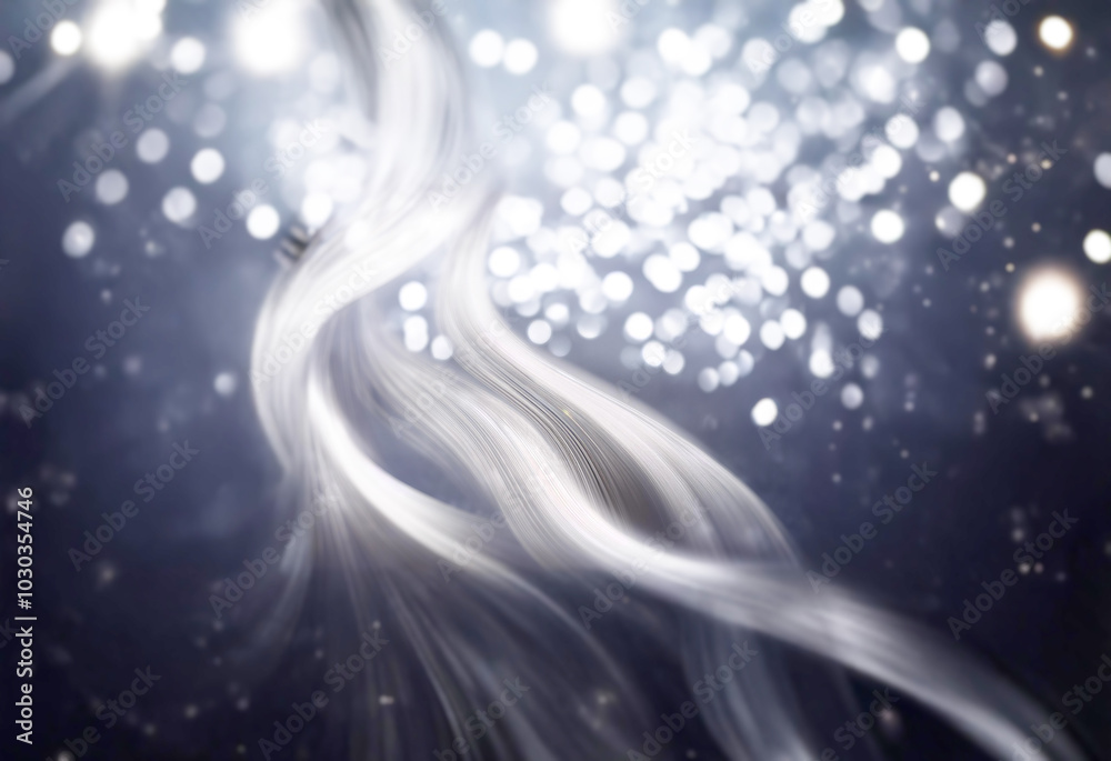 Aufkleber white streaks of light curve and twist against a dark, bokeh background.