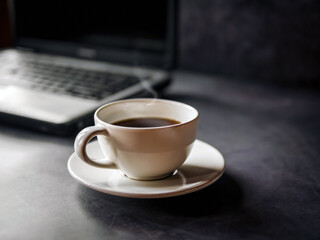Relax during business work concept, americano coffee cup and black coffee cup aromatic and laptop...