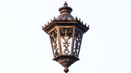 A classic lantern-style lamp with intricate metalwork, set against a white background, evoking a sense of timeless beauty and charm