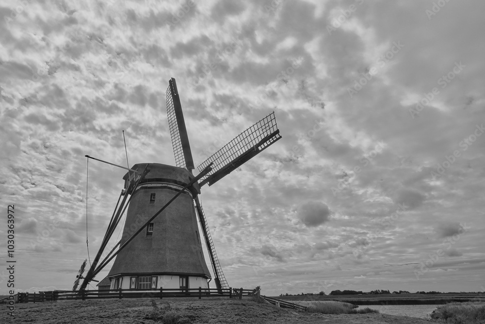 Wall mural old windmill in black and white