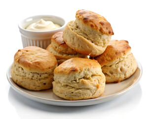 Warm wheat scones, served with clotted cream  isolated on a white background