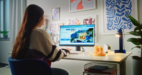 Back view of girl typing prompt in artificial intelligence app on PC. AI video generator generates...