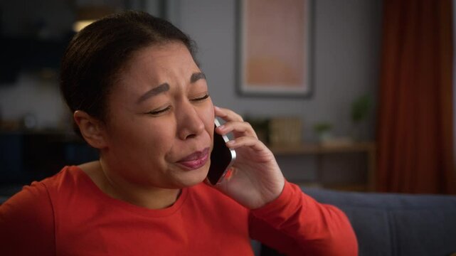 Close up worried anxiety bad feeling African American woman pregnant female girl suffering pain ache ill sick medicine problem health painful panic calling emergency talking phone with doctor at home