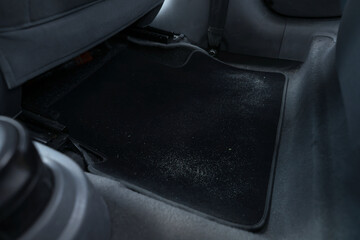 Black soft car floor mat in auto