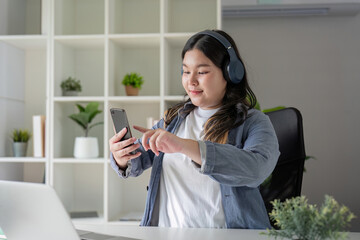 Engaged Fat Woman Managing Phone and Laptop for Remote Tasks