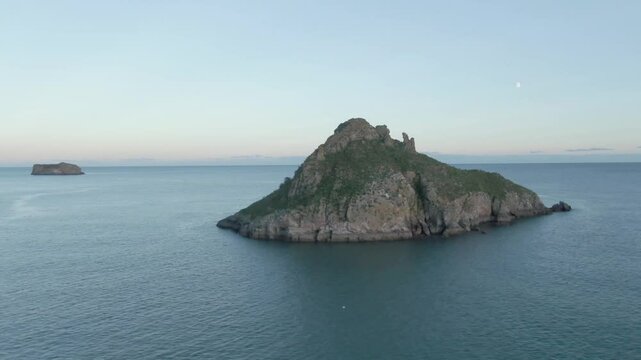 Thatcher Rock Torquay Drone Footage In the English riviera, sunny day, beautiful sky Ariel view of scenic landscape At sunset