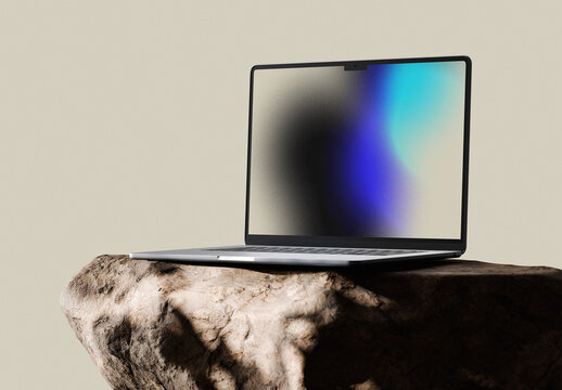 Laptop Device On The Stone Mockup