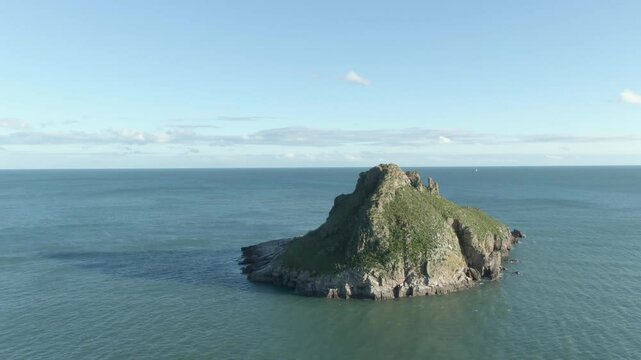 Thatcher Rock Torquay Drone Footage In the English riviera, sunny day, beautiful sky Ariel view of scenic landscape