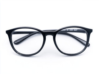 Black cat-eye glasses on a clean white surface, highlighting modern design elegance