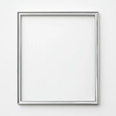 Minimalist silver picture frame with empty space on a blank white wall
