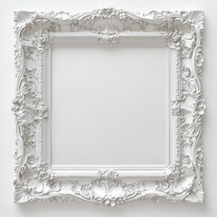 Ornate white decorative vintage picture frame with intricate floral details on wall