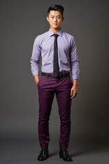 Fototapeta premium a man in purple color formal outfit standing in the studio with isolated background