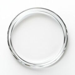 Simple reflective glass ring on plain white background