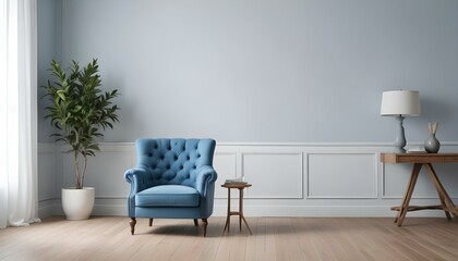 A tufted blue armchair in a minimalist room with white walls and a wooden floor.