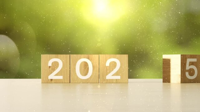 Closeup wooden block with word 2025 placed on wooden table with motion bokeh background. 3D animation.