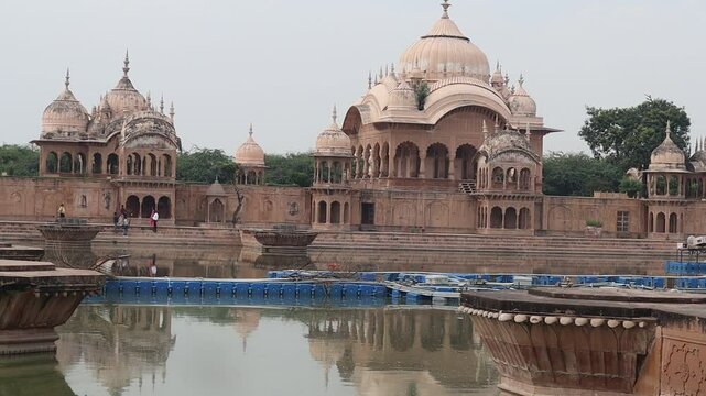 A serene view of Kusum Sarovar, a beautiful historical reservoir with stunning architecture, located in Govardhan, Mathura, Uttar Pradesh, India.